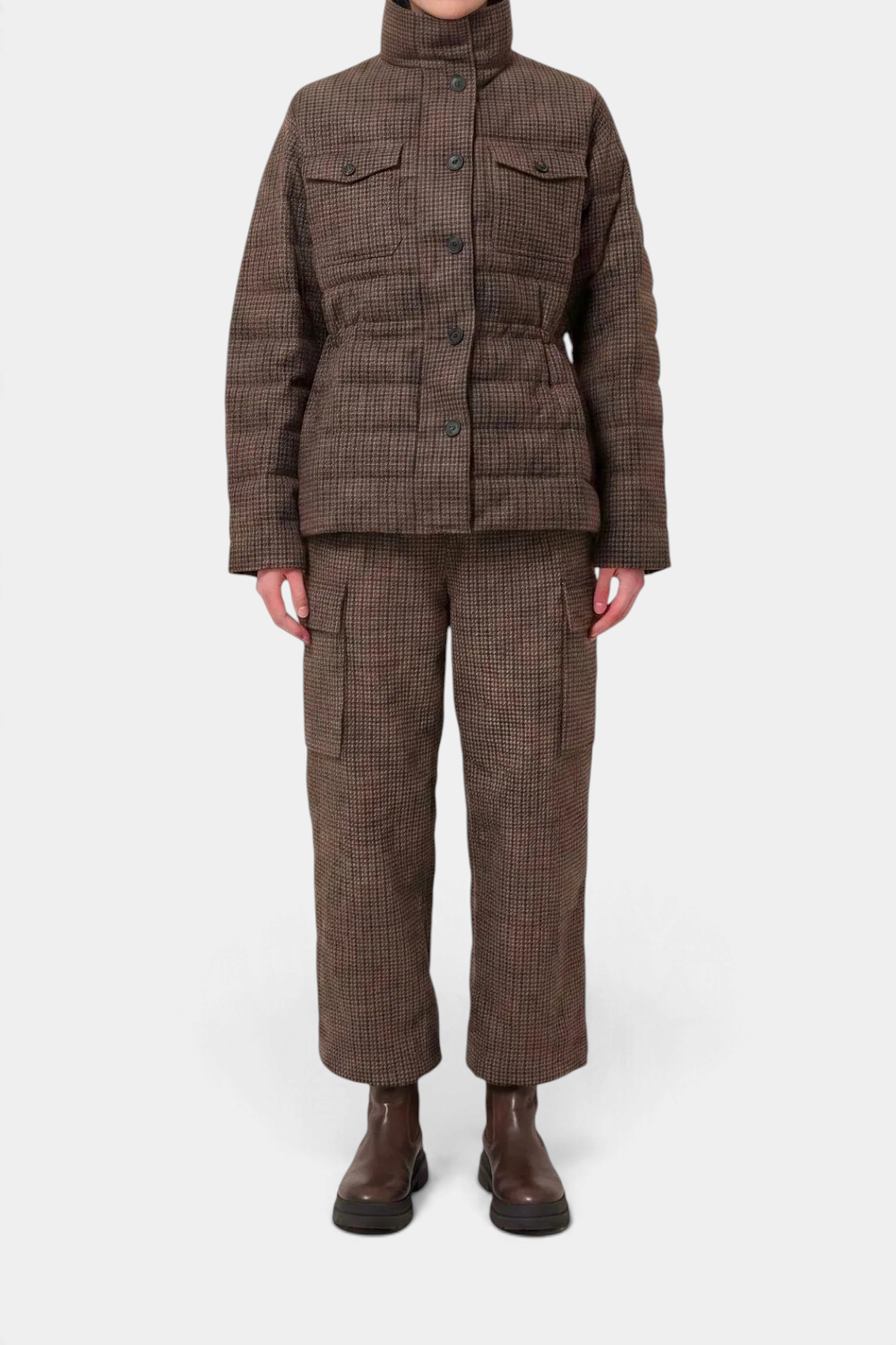 The Copper Shed Lottie women's brown houndstooth puffer jacket with stand-up collar and flap chest pockets.