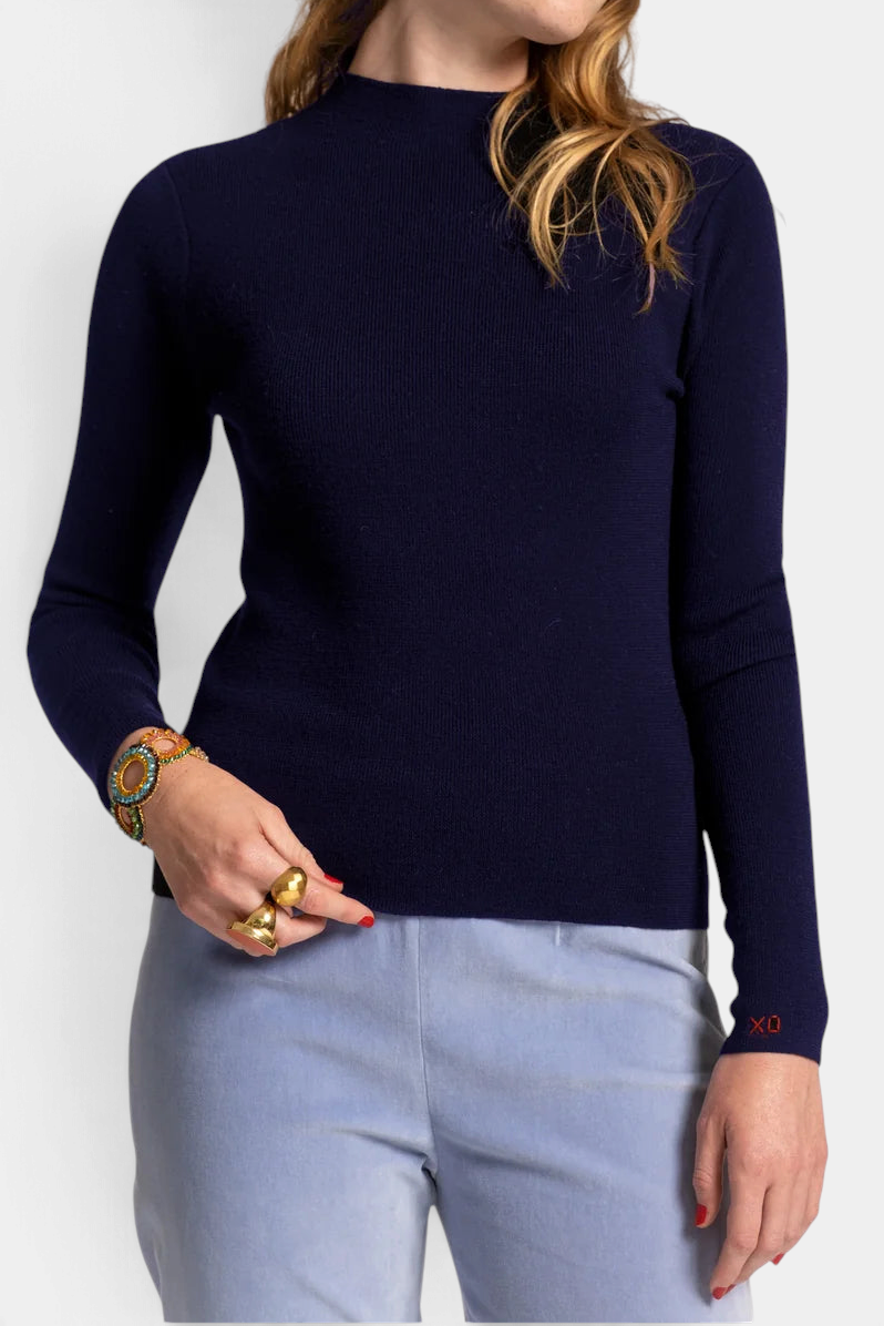 The Copper Shed Marie navy blue long sleeve rib knit cotton mock neck sweater with signature xo embroidery detail