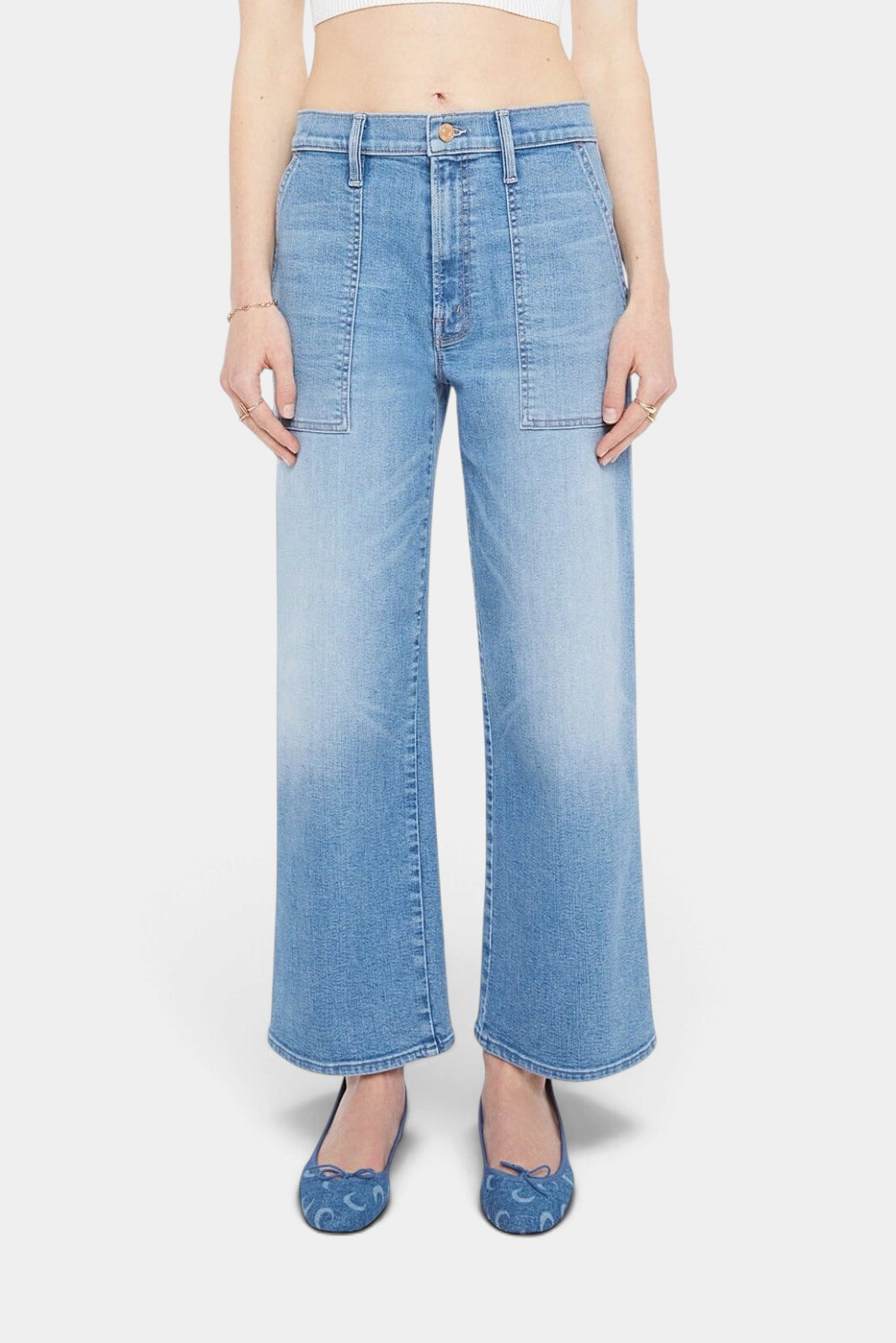The Copper Shed Maven Flood high-waisted wide-leg jeans in light blue stretch denim with patch pockets and clean hem.