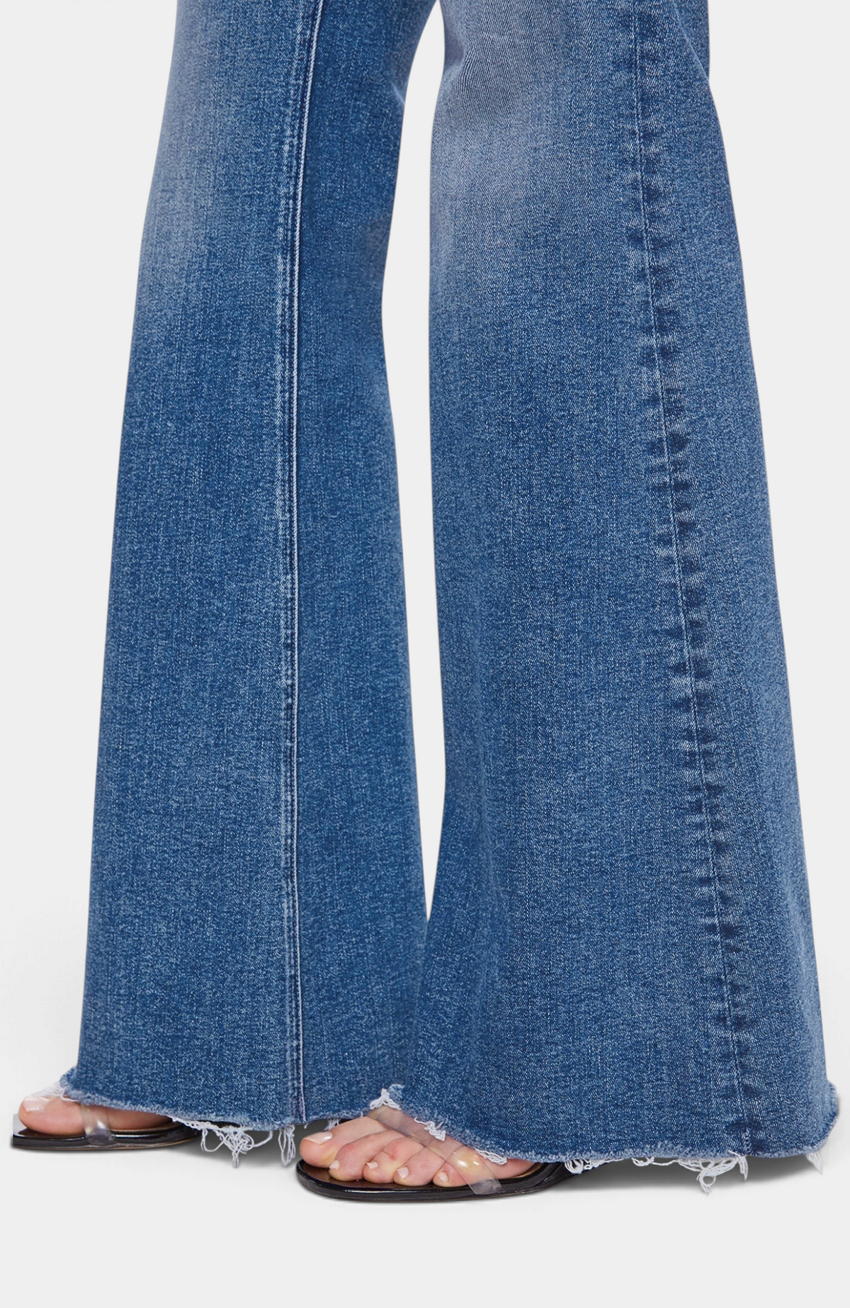 The Copper Shed The Doozy Sneak Fray mid-blue stretch denim flare jeans with a frayed hem and whiskered finish
