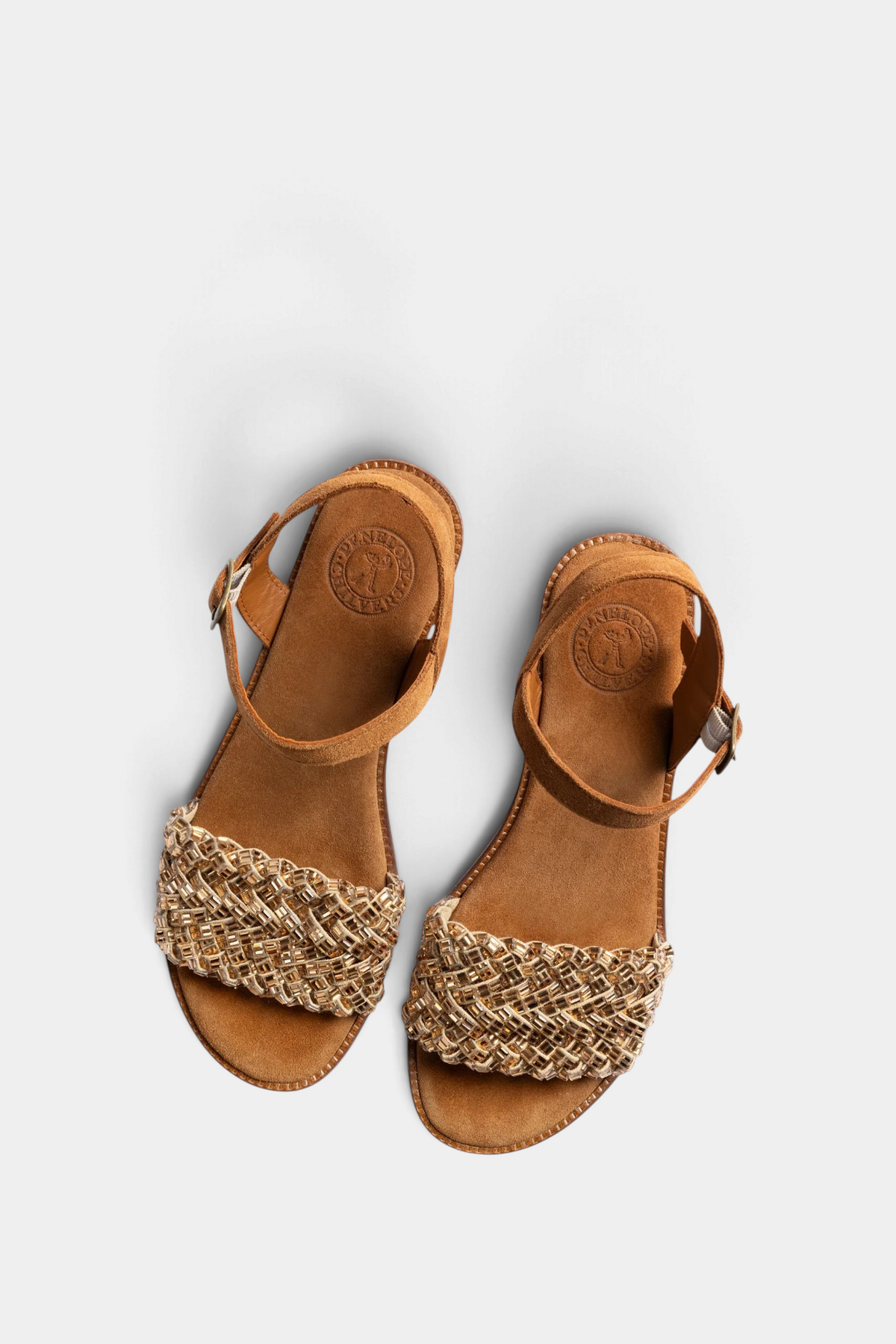 The Copper Shed Milos tan split suede sandals featuring a woven diamante trim and a comfortable 3cm leather heel.