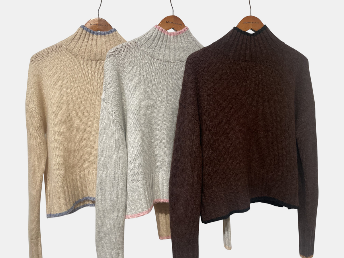 The Copper Shed mockneck sweaters in beige, grey, and brown with contrast color tipping on neck, cuffs, and hem.