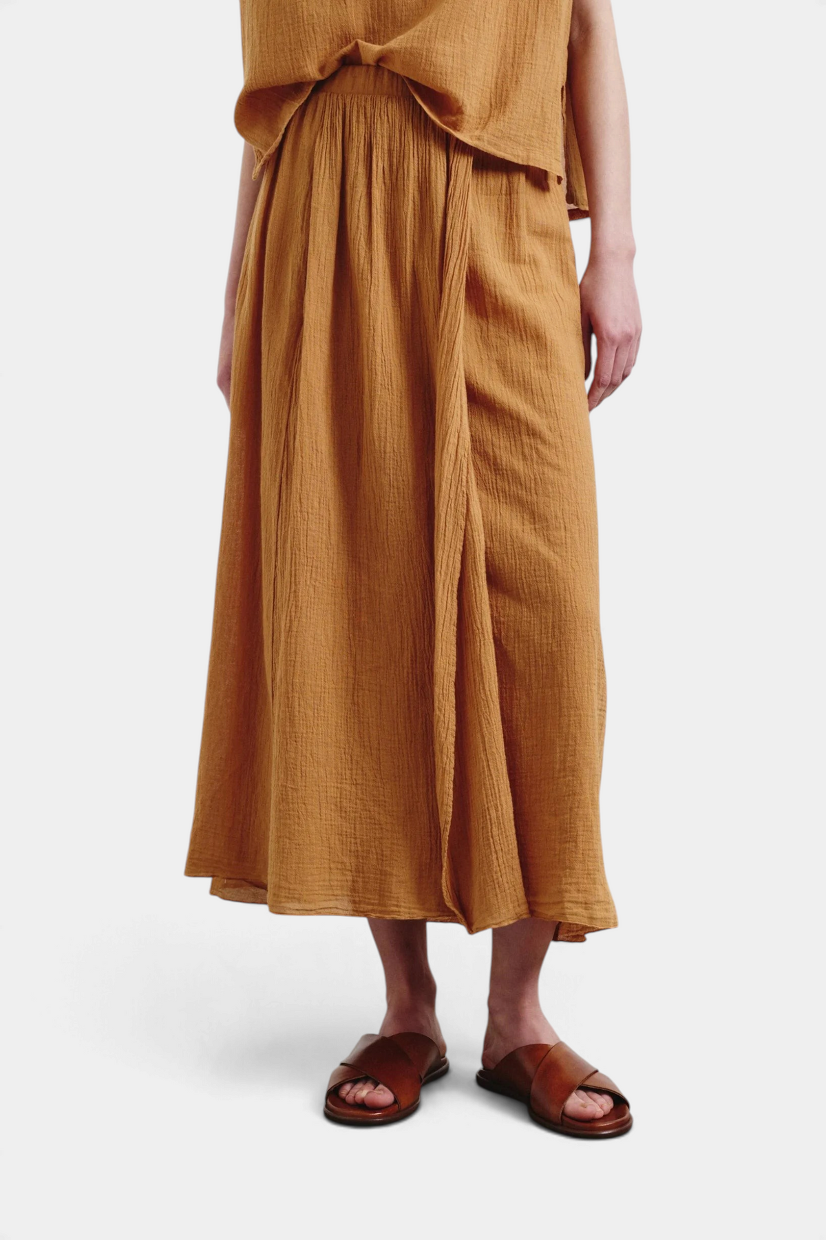 The Copper Shed organic cotton crepe gauze skirt in mustard yellow with front gathers and elasticated waistband