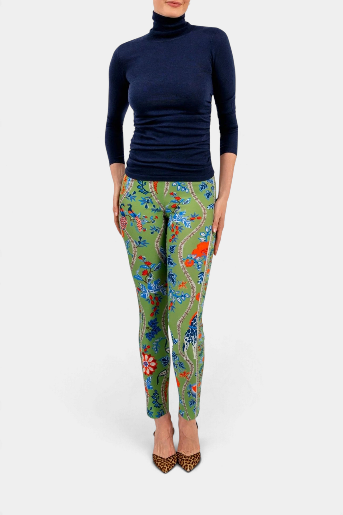 The Copper Shed I'm Too Sexy navy blue cashmere turtleneck sweater paired with green floral print leggings