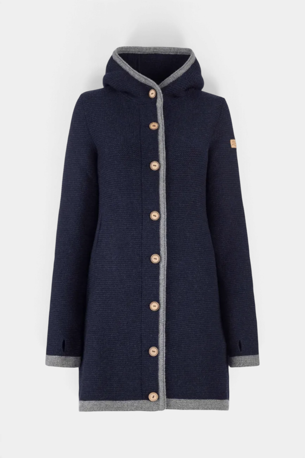 The Copper Shed Mecida navy blue merino lambswool trachten jacket with a hood, grey trim, and wooden buttons.
