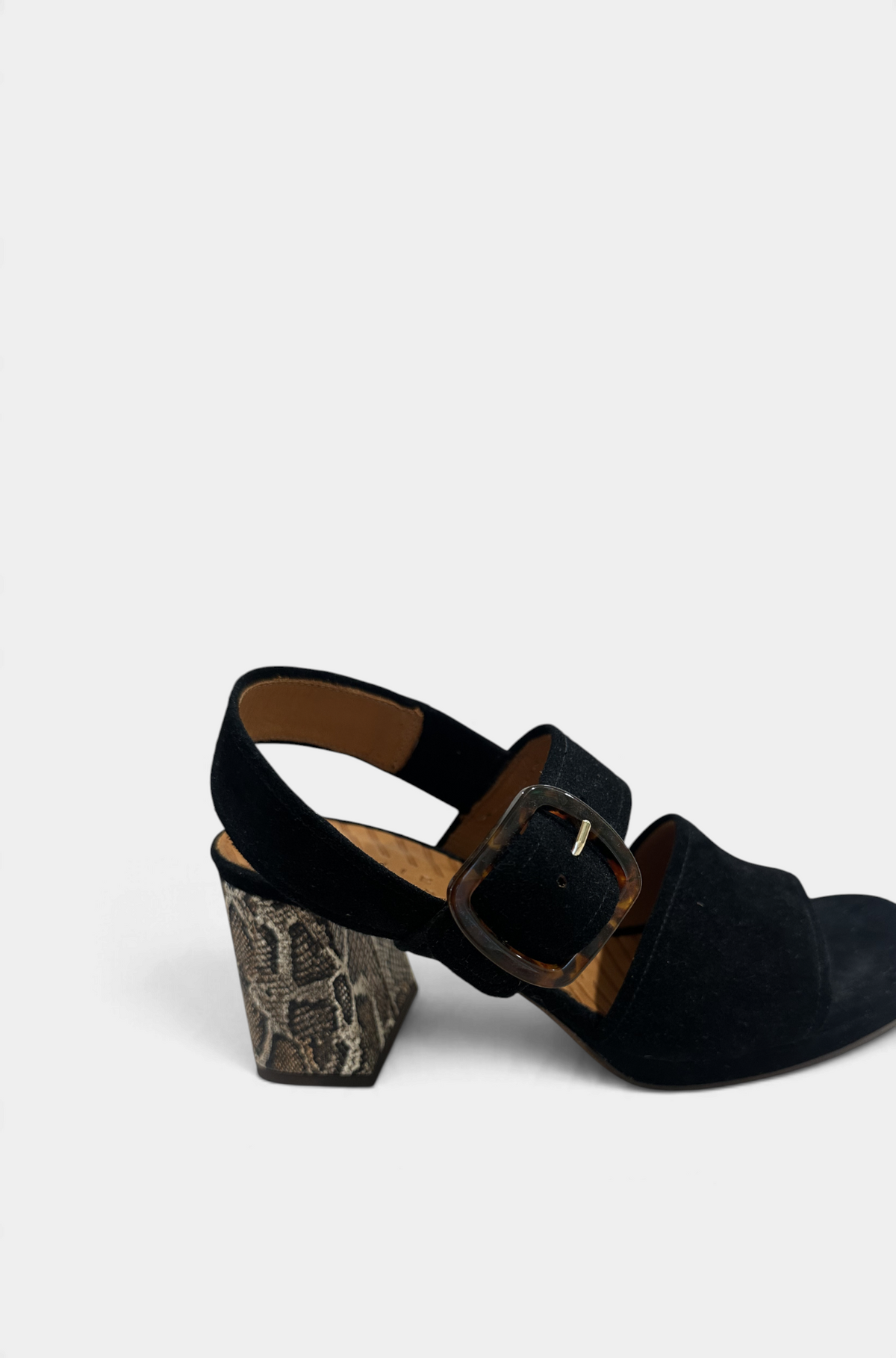 The Copper Shed Ogiki Heel in black suede with a tortoiseshell buckle and snakeskin print block heel