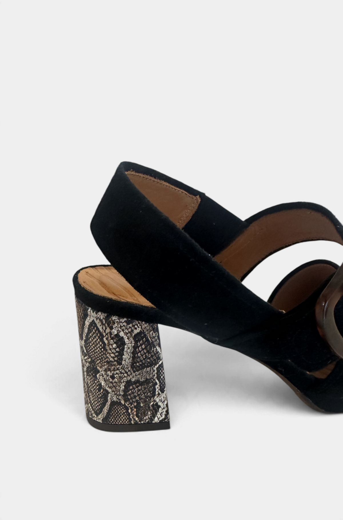 The Copper Shed Chie Mahara Ogiki heel featuring a black suede strap and a snakeskin patterned block heel.