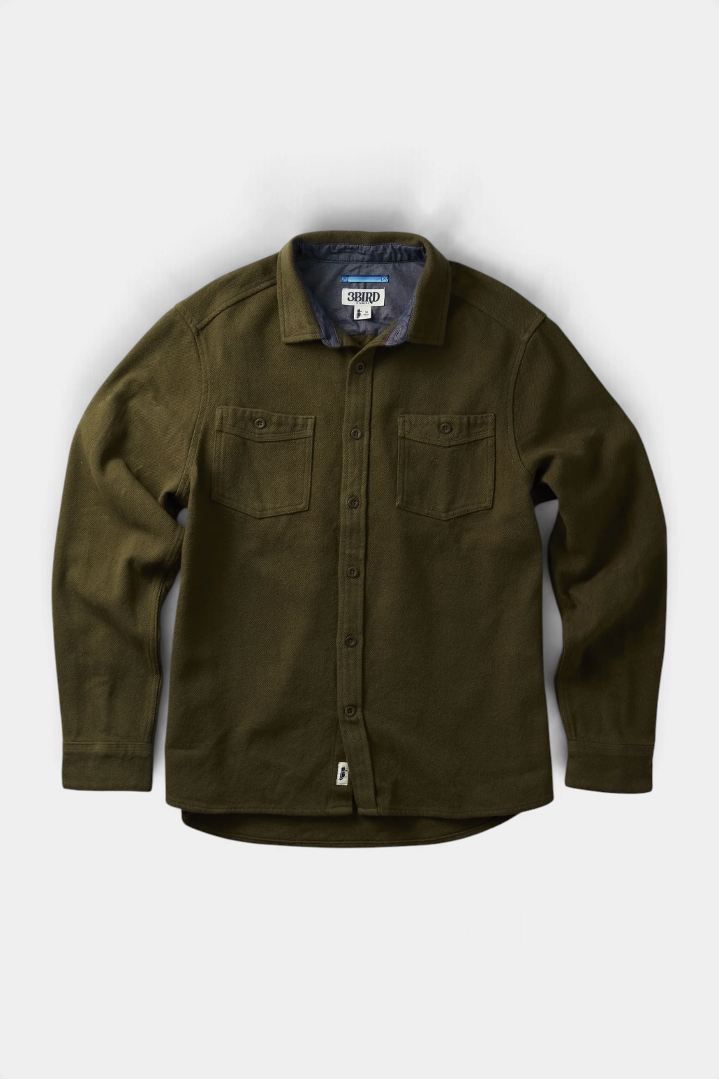 The Copper Shed Frontier Flannel in olive green organic cotton with dual chest pockets and Corozo buttons.
