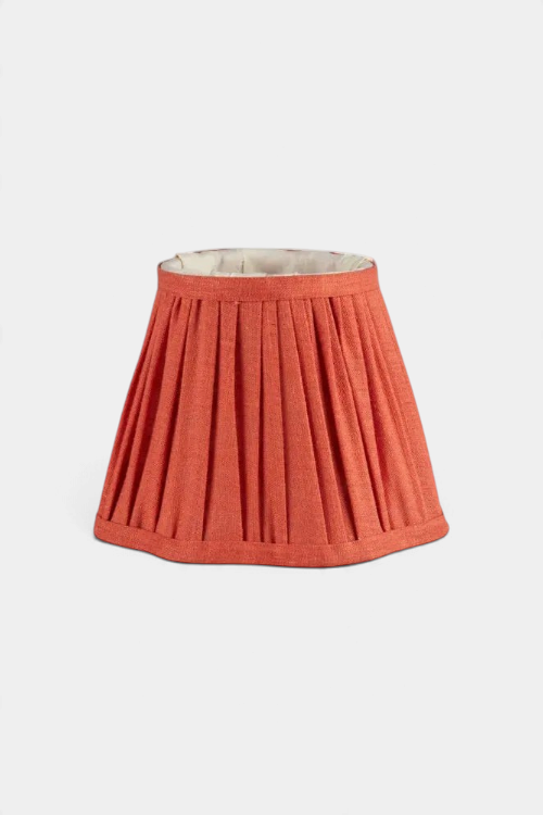 The Copper Shed orange pleated linen-viscose lampshade with a contemporary scalloped edge for E14 bulb holders.