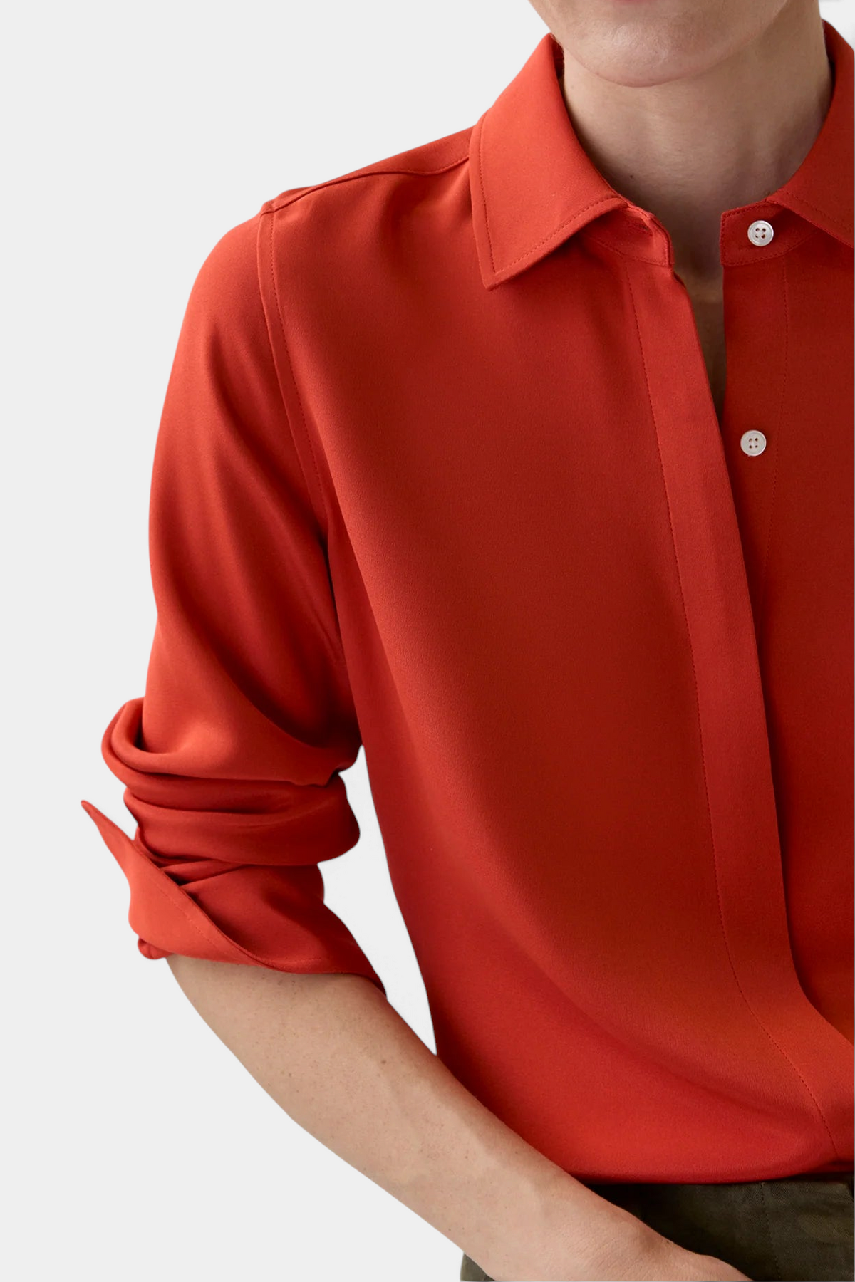The Copper Shed classic silk blouse in vibrant red crepe de chine with a point collar and mother-of-pearl buttons.