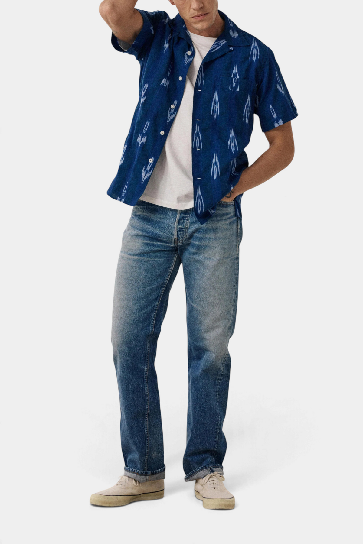 The Copper Shed Palmito short-sleeved indigo cotton shirt with traditional Ikat print and open Cuban collar