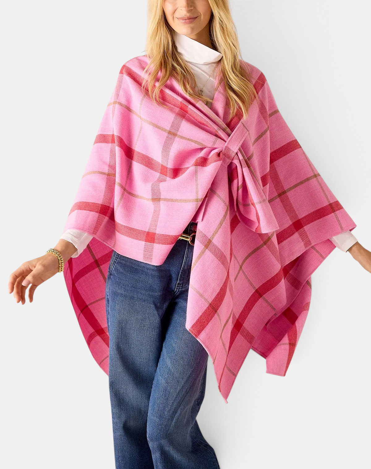 The Copper Shed peppermint plaid acrylic travel wrap with a secure loop and soft brushed finish worn by a woman.