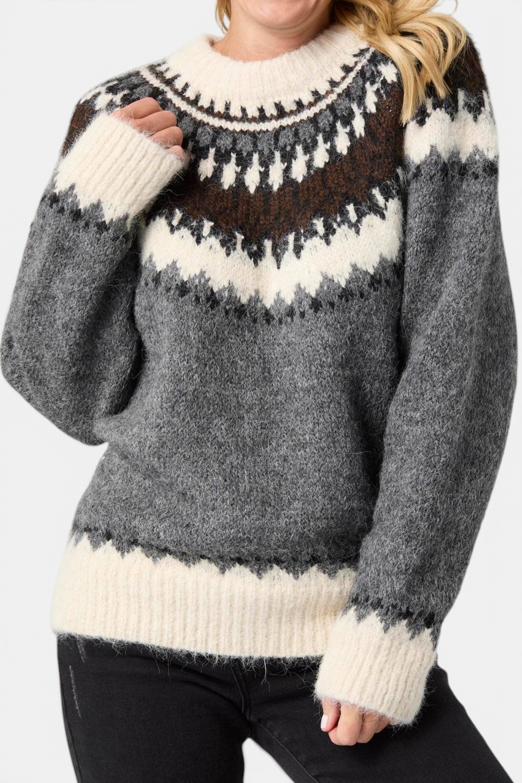 The Copper Shed Perissa heavy mock neck sweater in grey with a cream and brown Fair Isle patterned yoke.