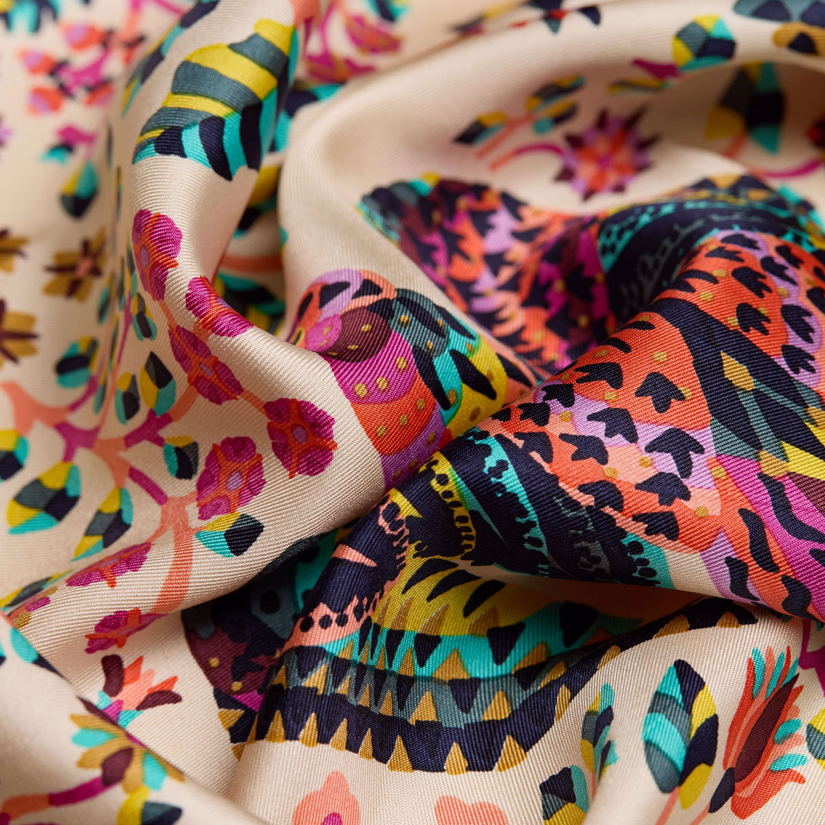 The Copper Shed Square 65 Perrot silk scarf featuring a vibrant multi-colored abstract floral and geometric pattern.
