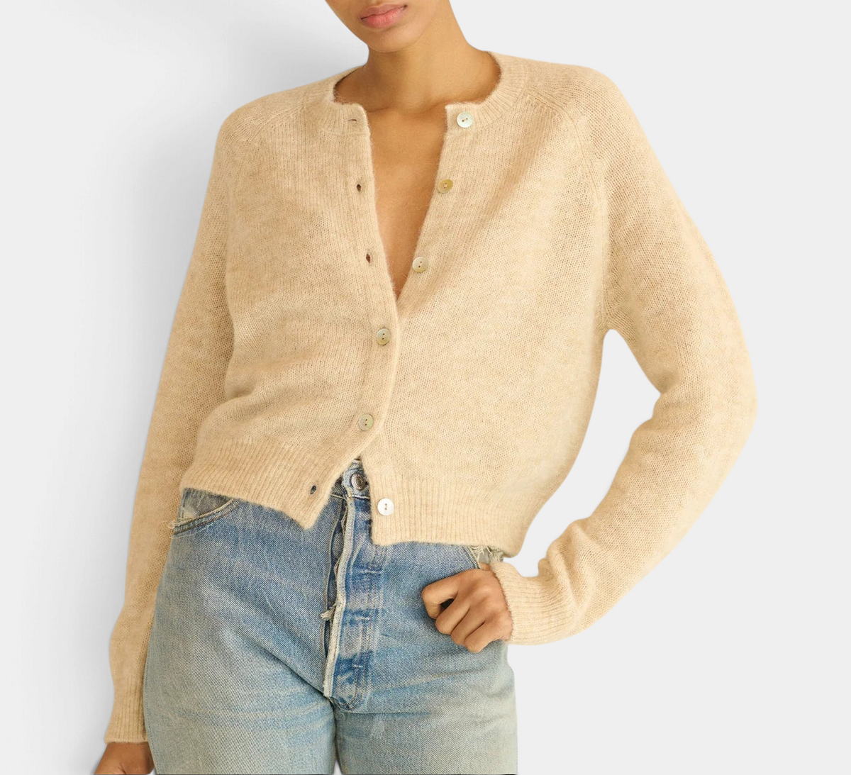 The Copper Shed Petra Cardigan in beige alpaca and merino wool blend with shell buttons and raglan sleeves.