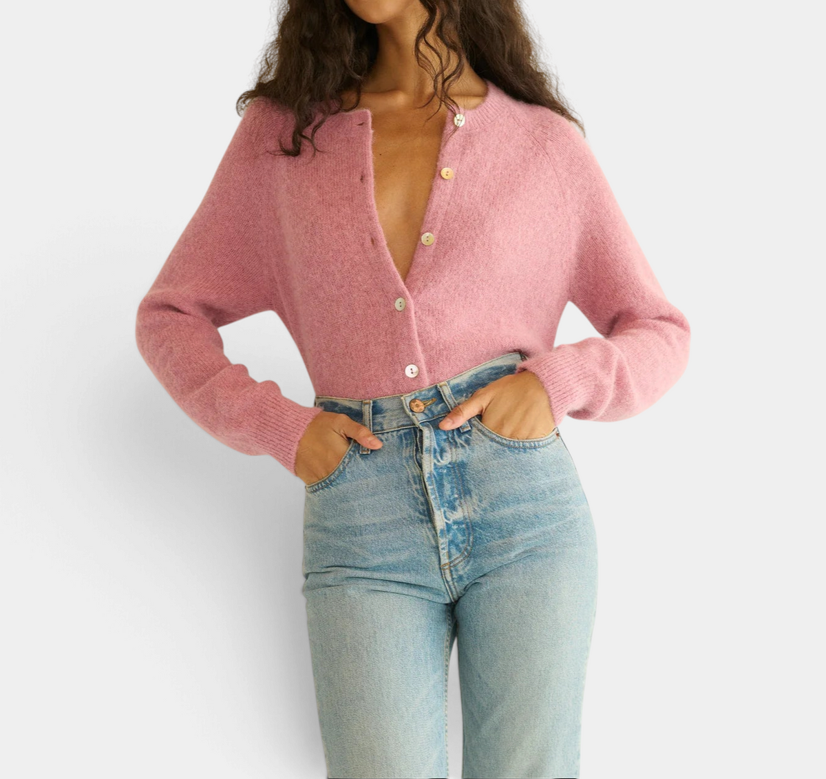 The Copper Shed Petra Cardigan in soft pink alpaca and merino wool blend with shell buttons and raglan sleeves.