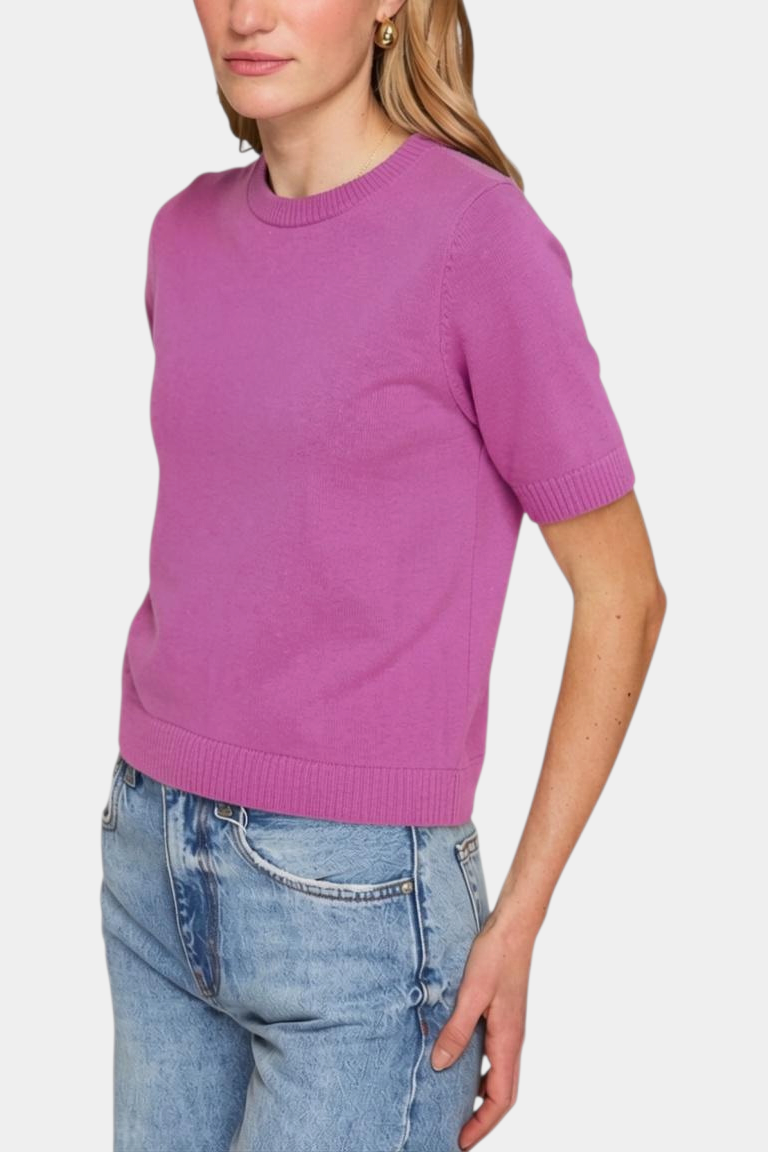 The Copper Shed Autum Cashmere short sleeve cropped crew neck sweater in vibrant pink with ribbed trim details.