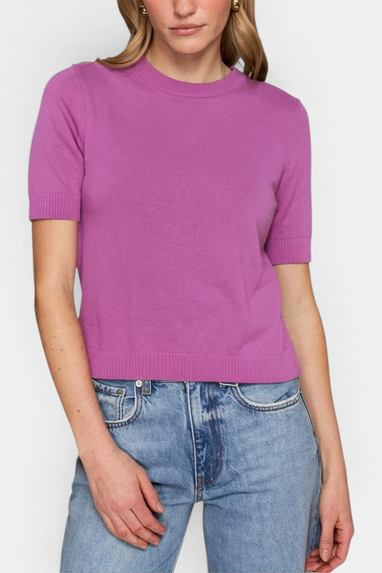 The Copper Shed Autum Cashmere short sleeve cropped crew neck sweater in vibrant pink with ribbed trim details.