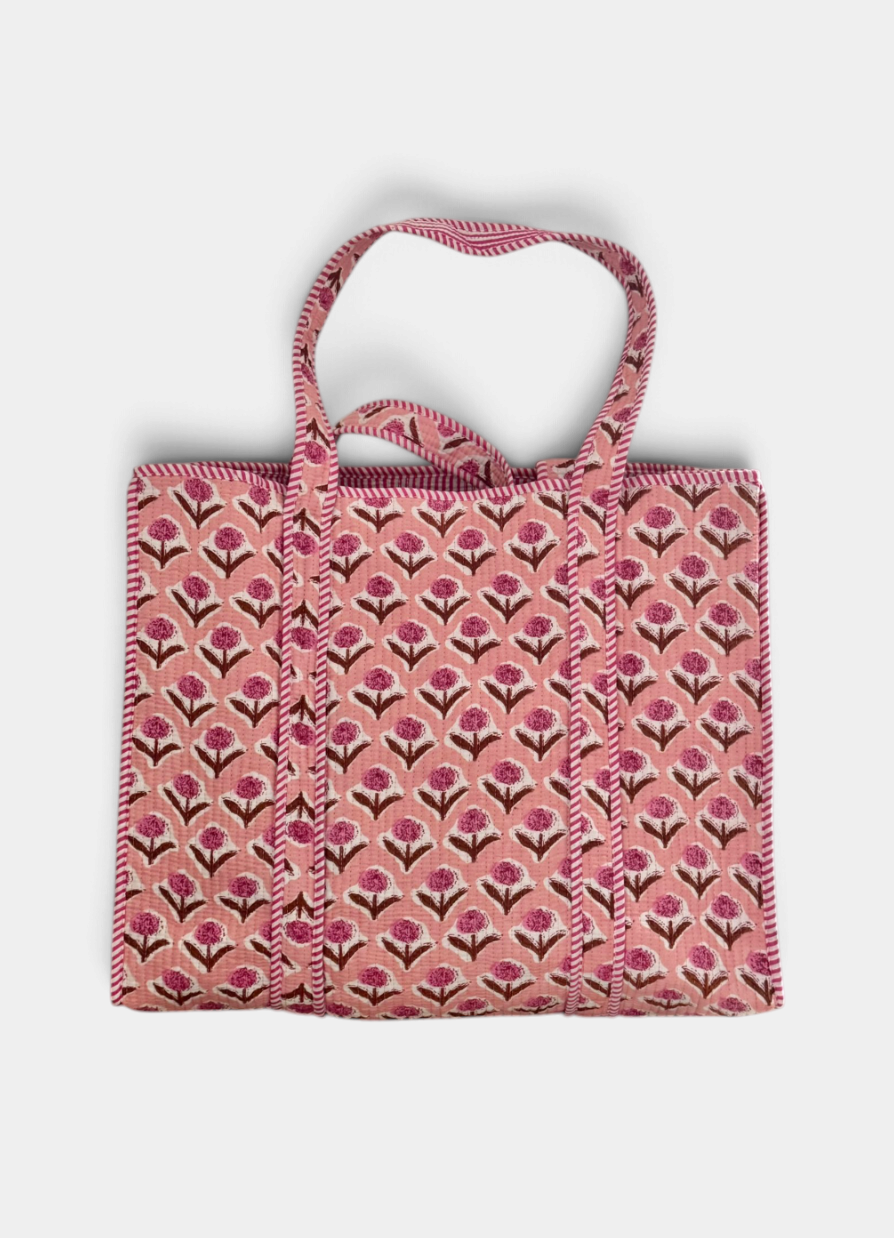 The Copper Shed pink quilted cotton tote bag with a handprinted floral block pattern and striped handles