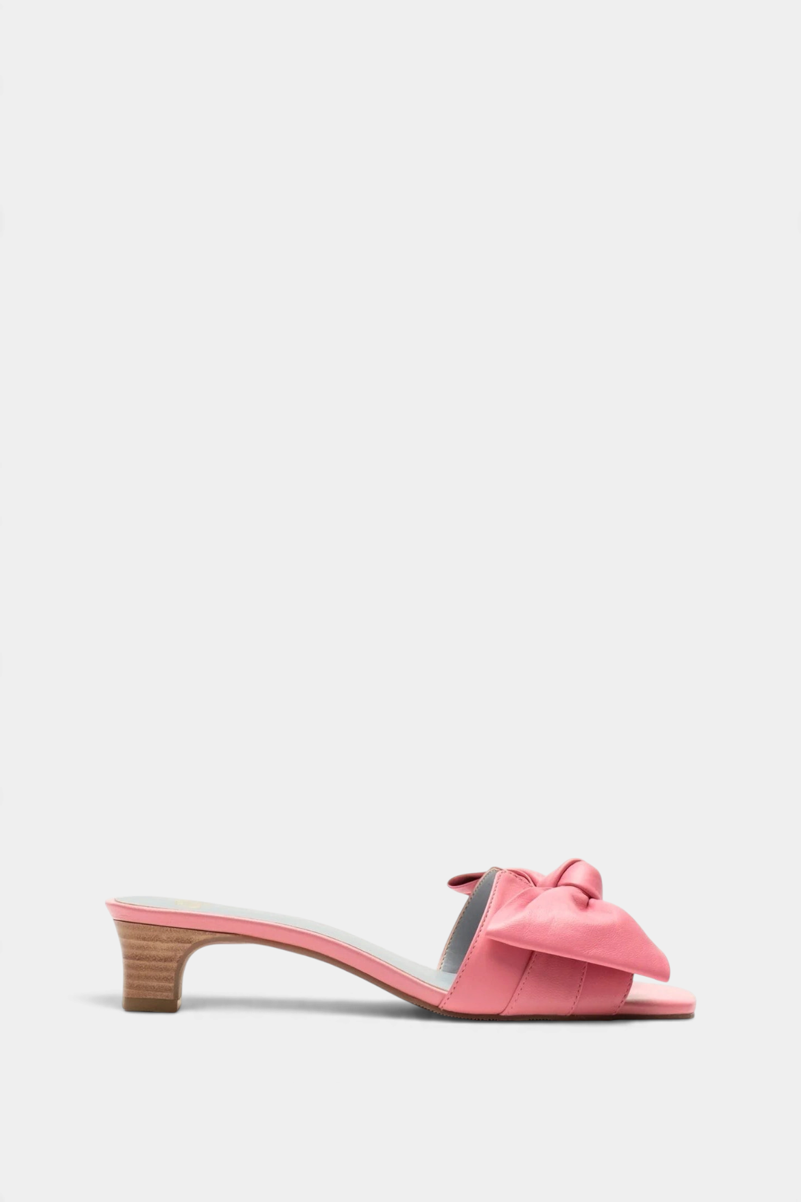 The Copper Shed pink nappa leather mule with a front bow detail and a 1.75-inch stacked wooden heel