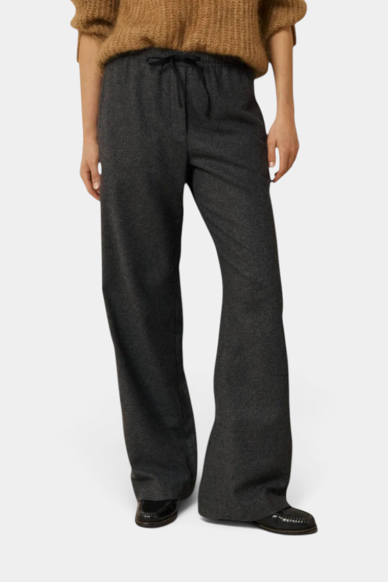 The Copper Shed Plumiel women's grey wool flannel wide-leg pants with an elasticized drawstring waist.