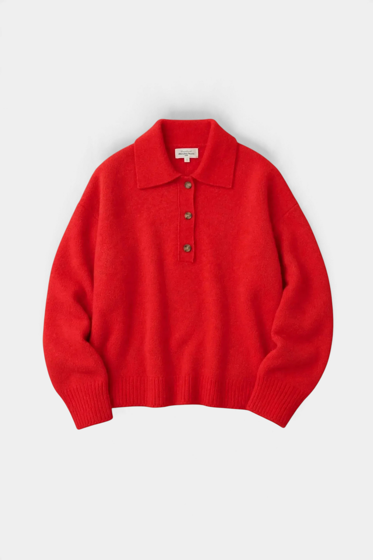The Copper Shed Muiden knit pullover in vibrant red wool-alpaca blend with a polo collar and button placket.
