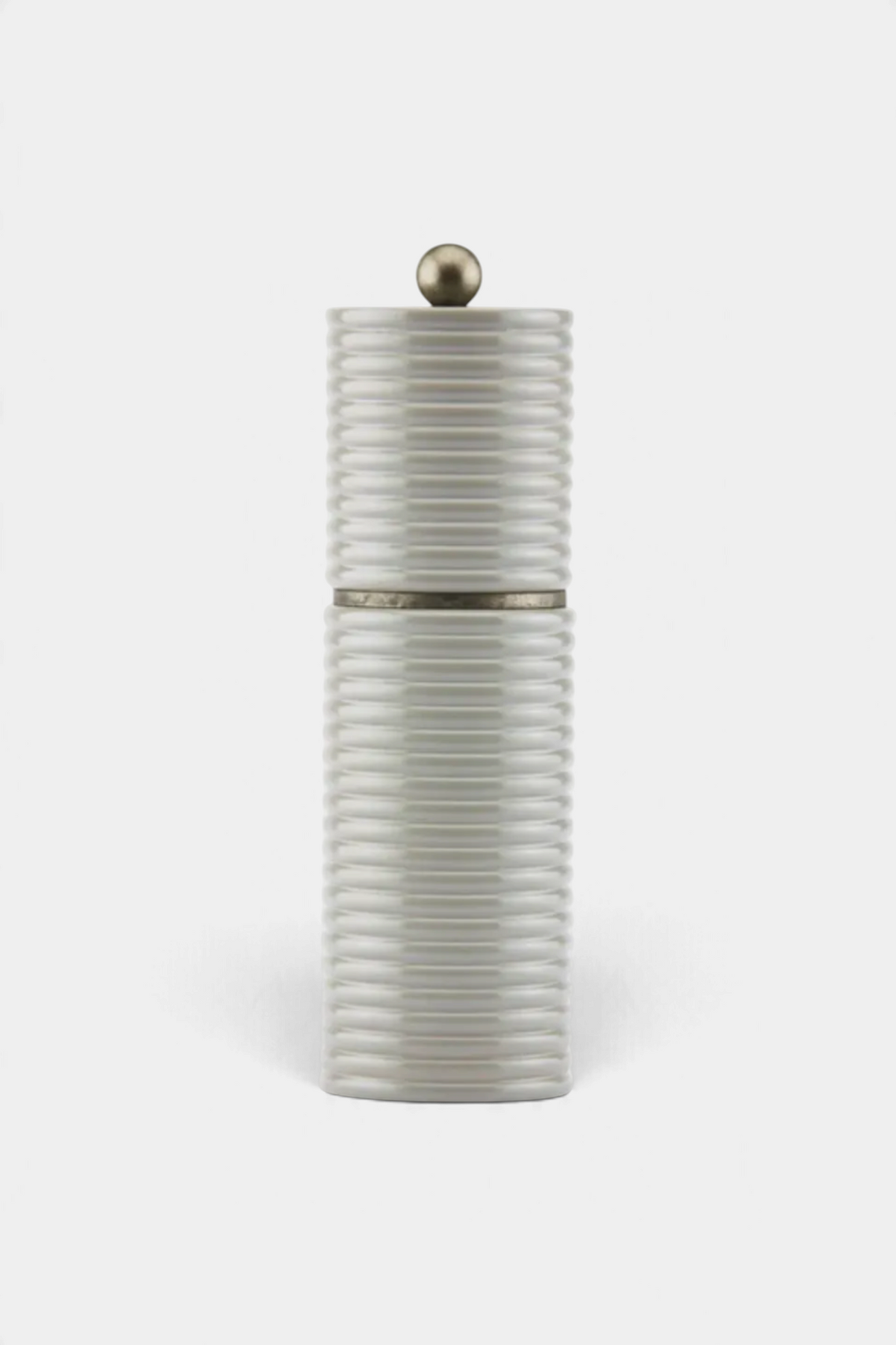The Copper Shed Sophie Paterson Reed salt or pepper mill in ribbed wood with an antique brass top knob and trim.