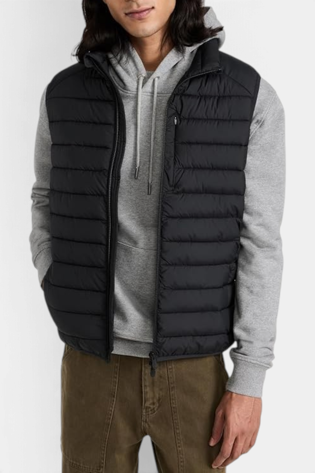 The Copper Shed Rhus men's black quilted puffer vest with stand-up collar, zippered pockets, and recycled padding.