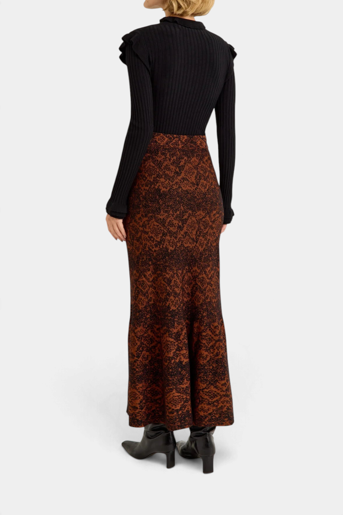 The Copper Shed Shiloh Skirt in a brown and black jacquard pattern with a fitted silhouette and flared hem