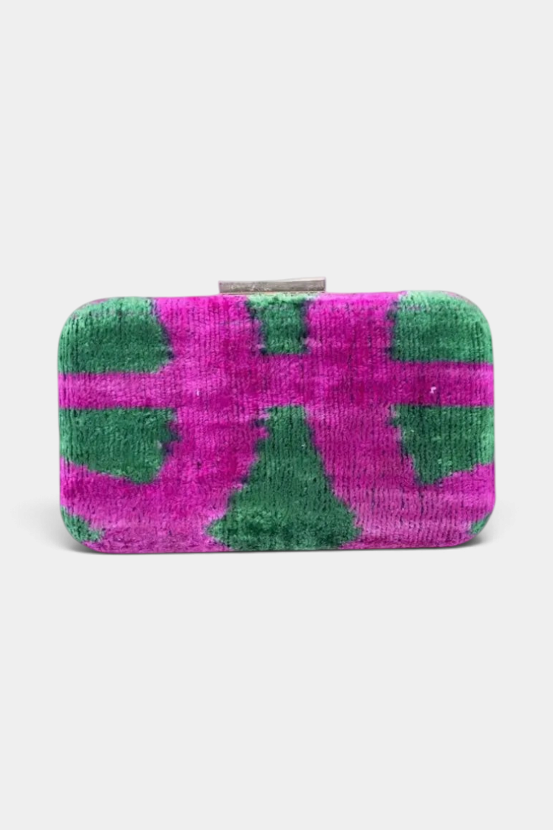 The Copper Shed structured box clutch in pink and green handwoven silk velvet with a unique ikat pattern.