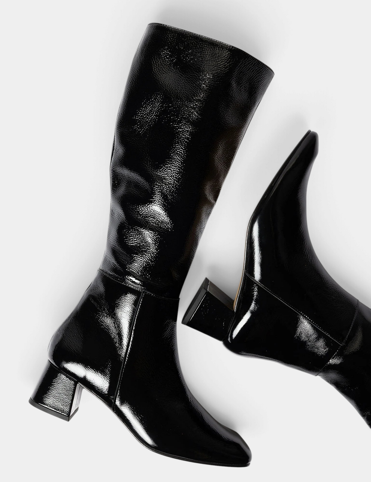 The Copper Shed Sinatra black patent leather knee-high boots with a square toe and mid block heel.