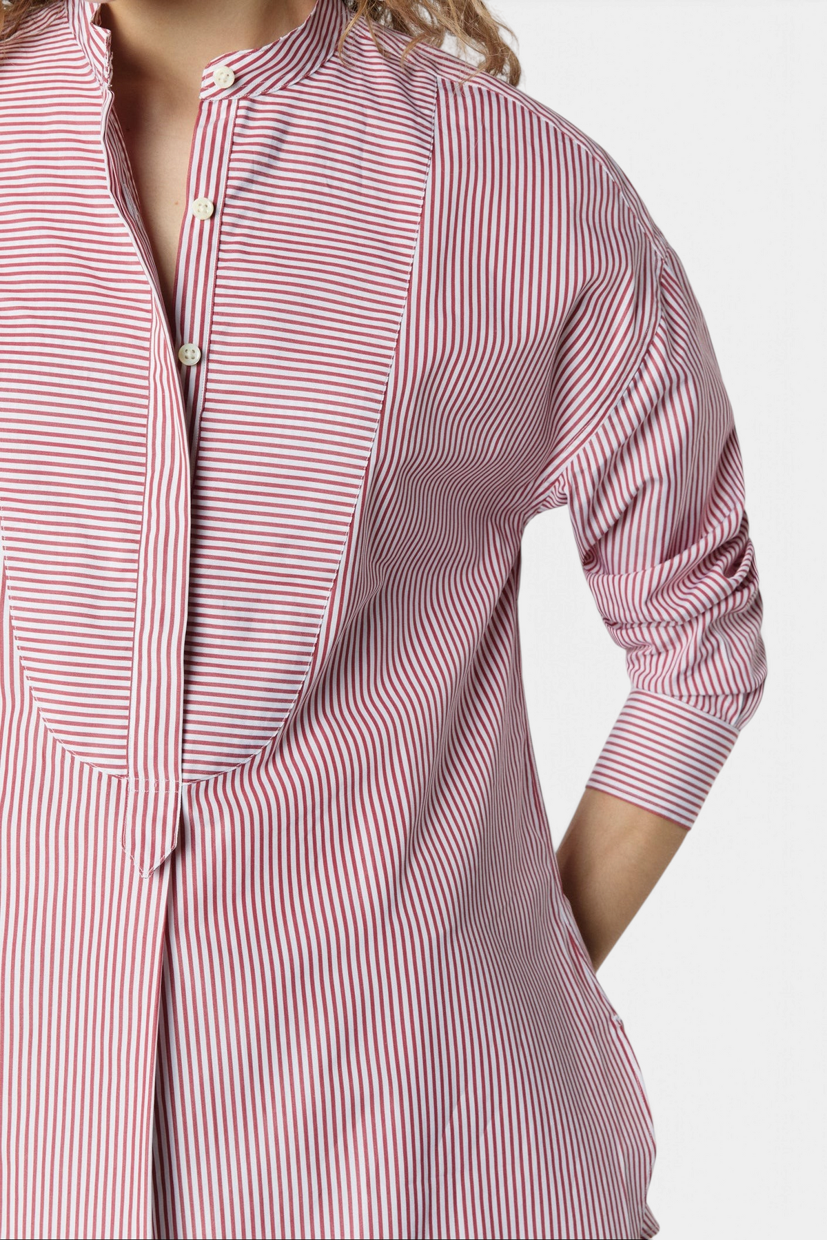 The Copper Shed Christiane tunic in red and white striped Italian cotton poplin with a bib-front and mandarin collar