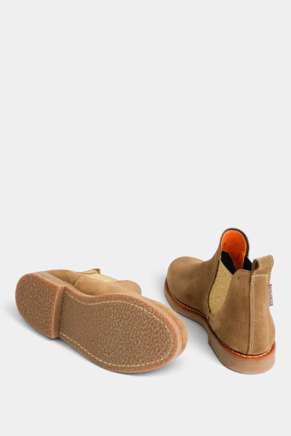The Copper Shed Safari Suede Boot in tan with a durable crepe rubber sole and classic glove construction.