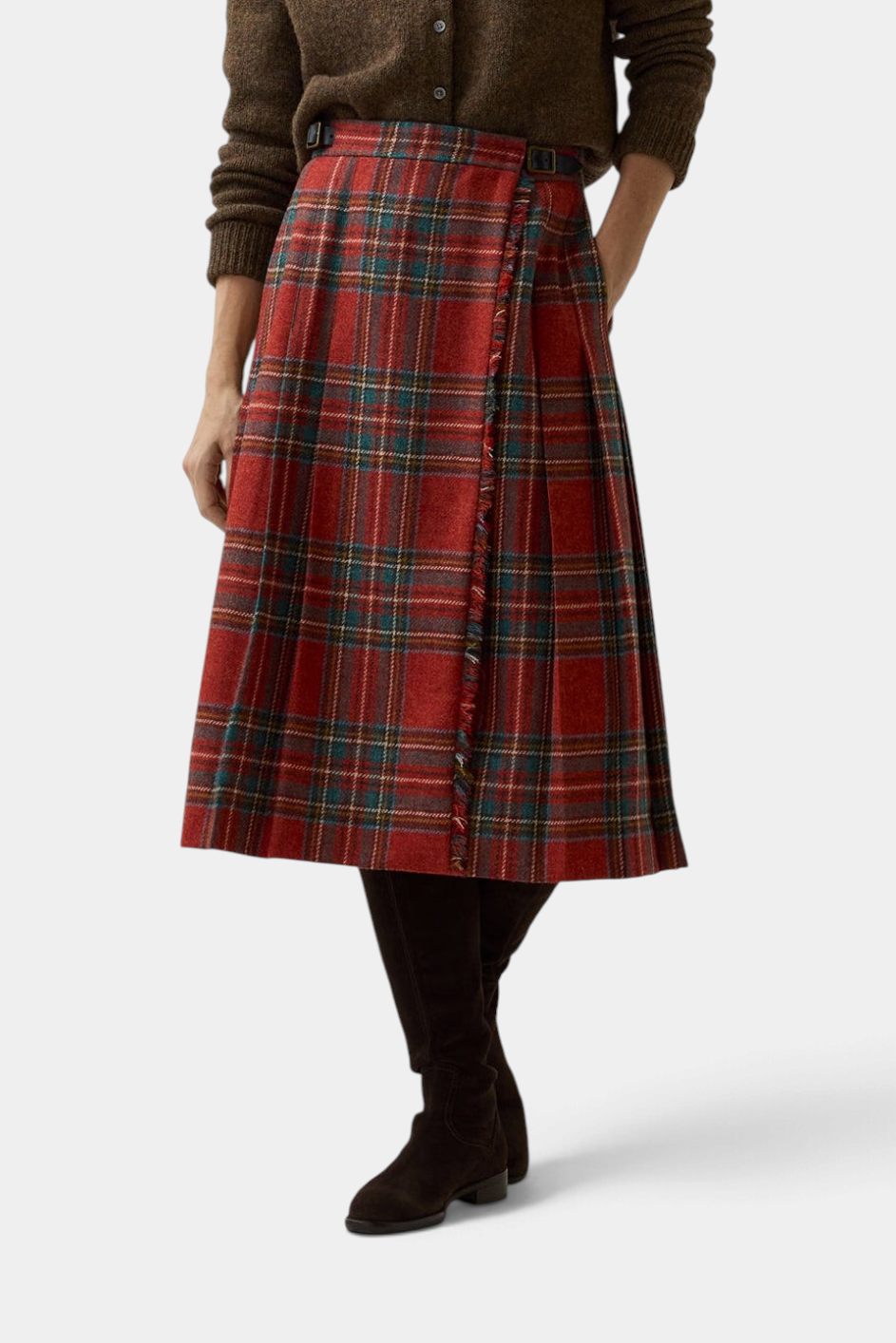 The Copper Shed Royal Stewart tartan wool kilt skirt with adjustable leather side straps worn with tall boots.