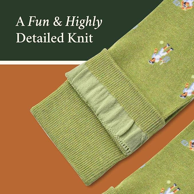 The Copper Shed Tennis Tantrum novelty socks in light green cotton knit with detailed tennis player patterns