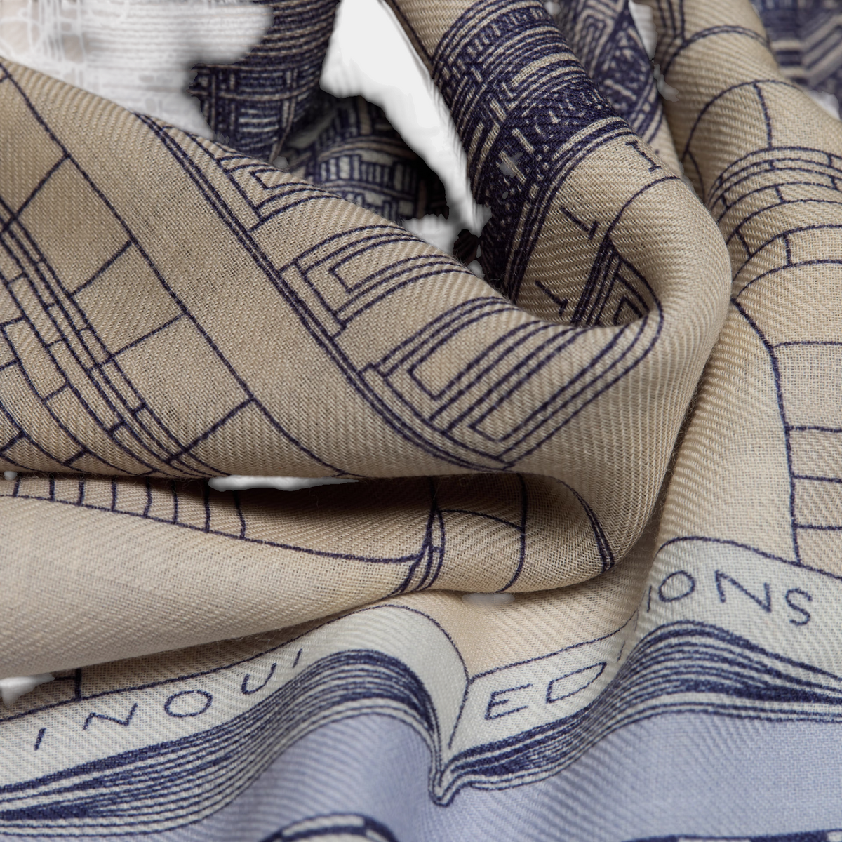 The Copper Shed Vivienne grey wool scarf featuring a detailed architectural line art print on soft fabric.