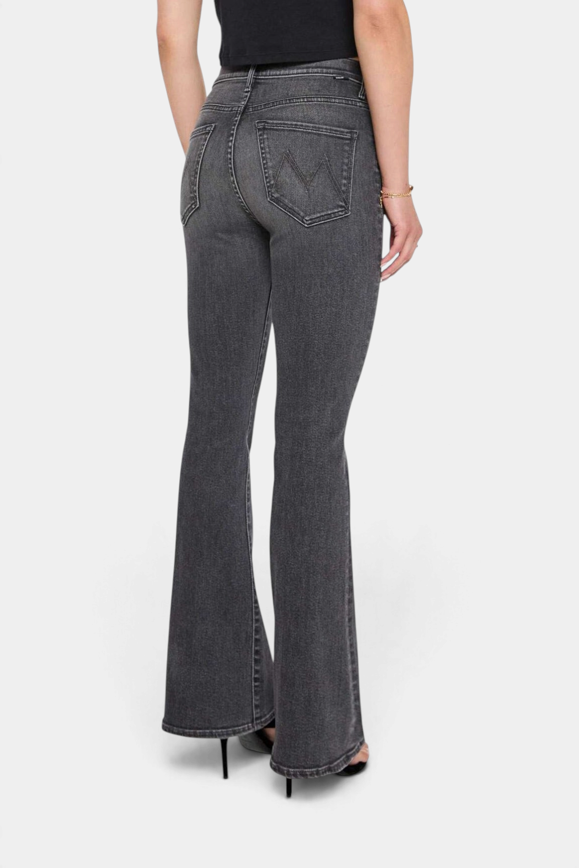 The Copper Shed The Weekender mid-rise flare jeans in washed black denim, back view showing pockets and clean hem.