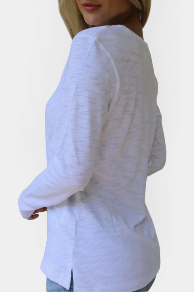 The Copper Shed white long sleeve Pima cotton slub crew neck shirt worn by a woman, side view.