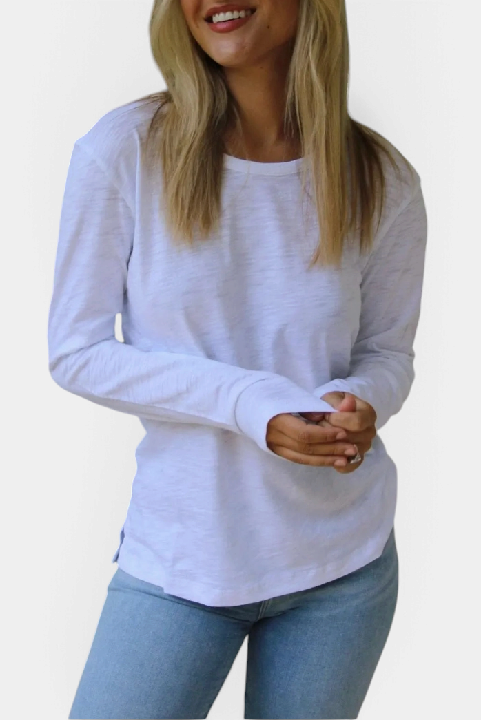 The Copper Shed white long sleeve Pima cotton slub crew neck shirt worn by a woman with light blue jeans
