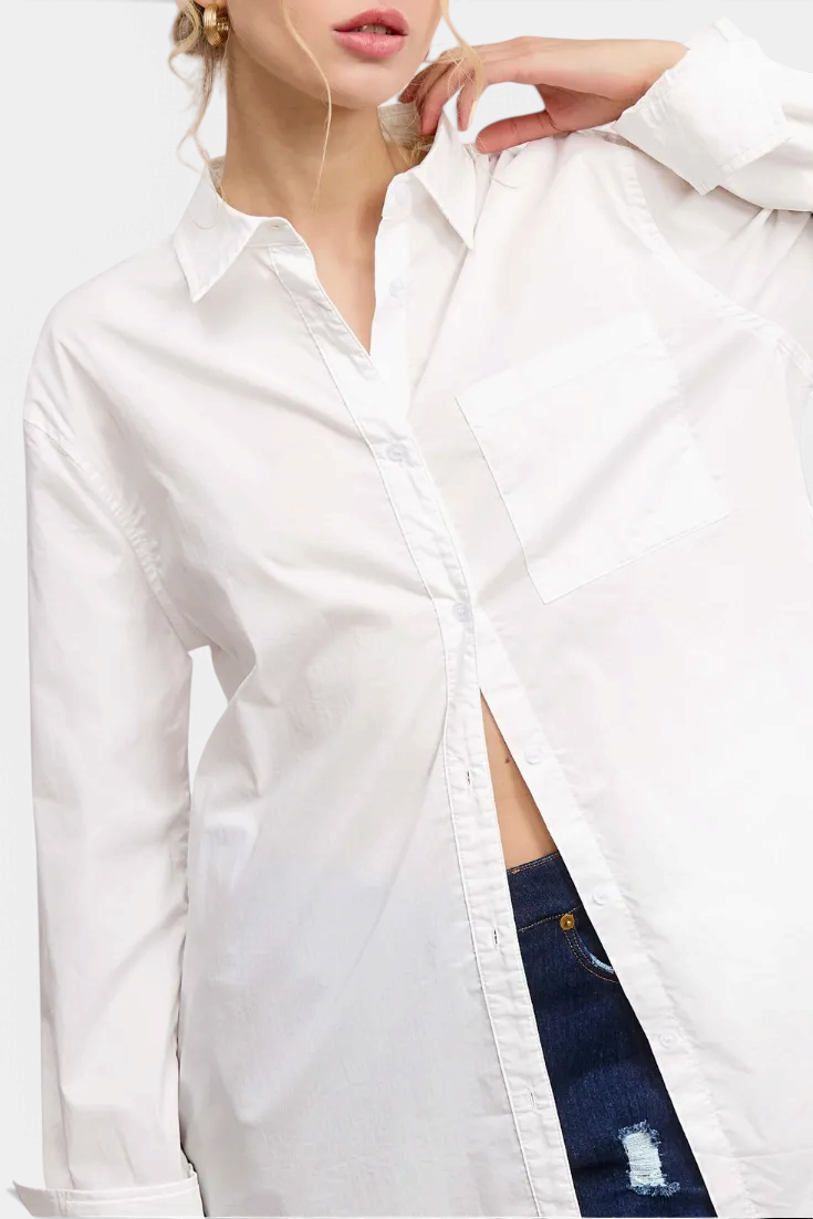 The Copper Shed white oversized poplin button-down shirt with a classic collar and front chest pocket.