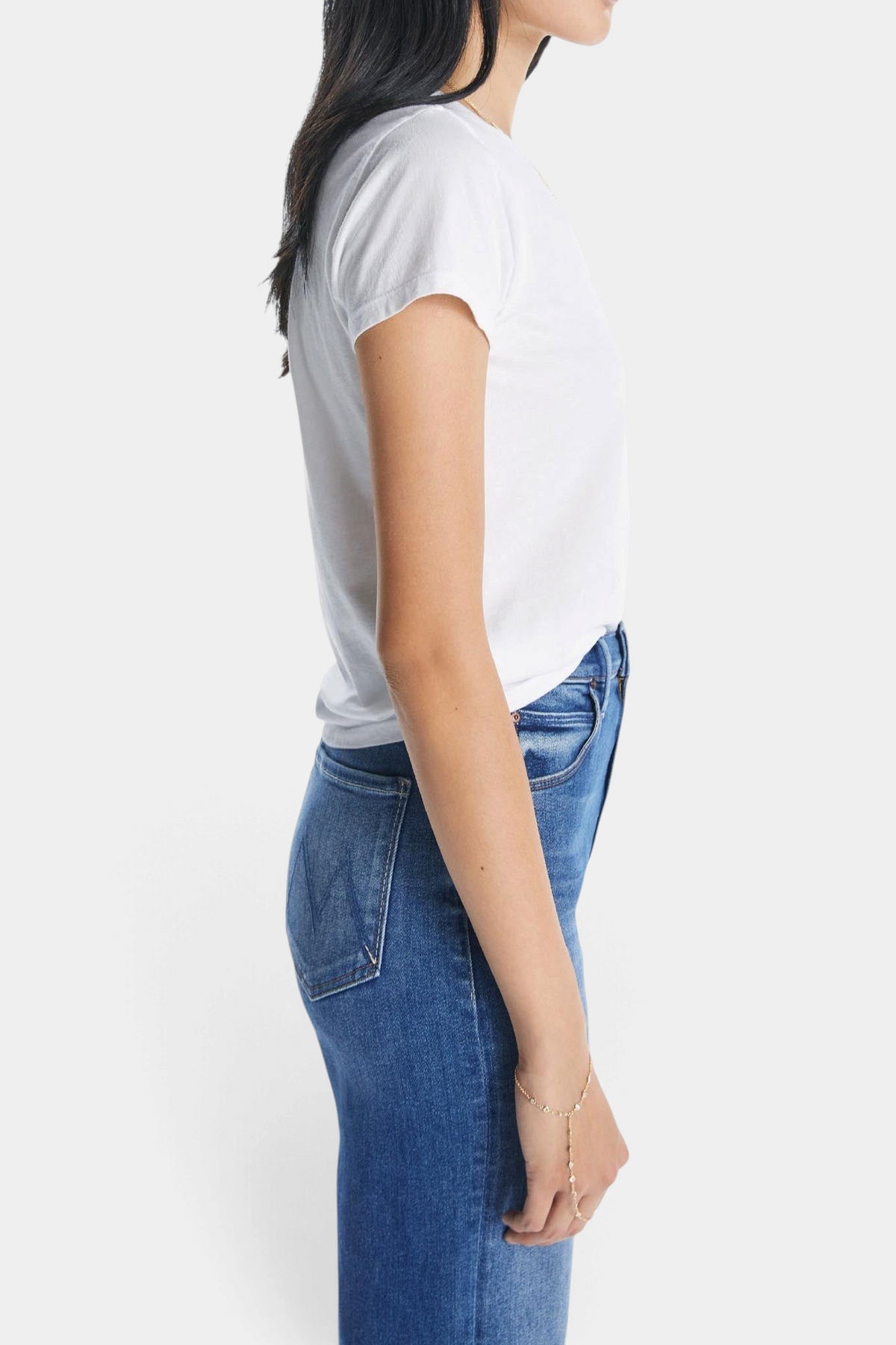 The Copper Shed bright white slim fit crewneck t-shirt in 100% supima cotton worn by a model in profile view