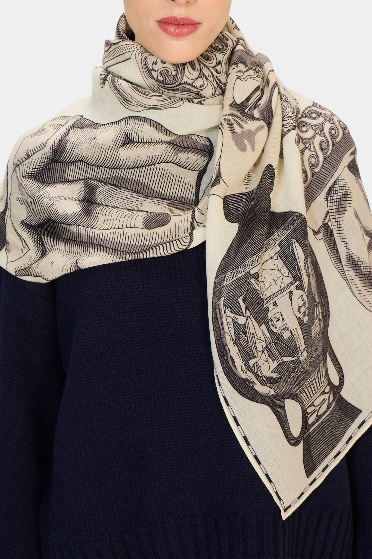 The Copper Shed white wool scarf featuring a detailed black archival print, worn draped around the neck.