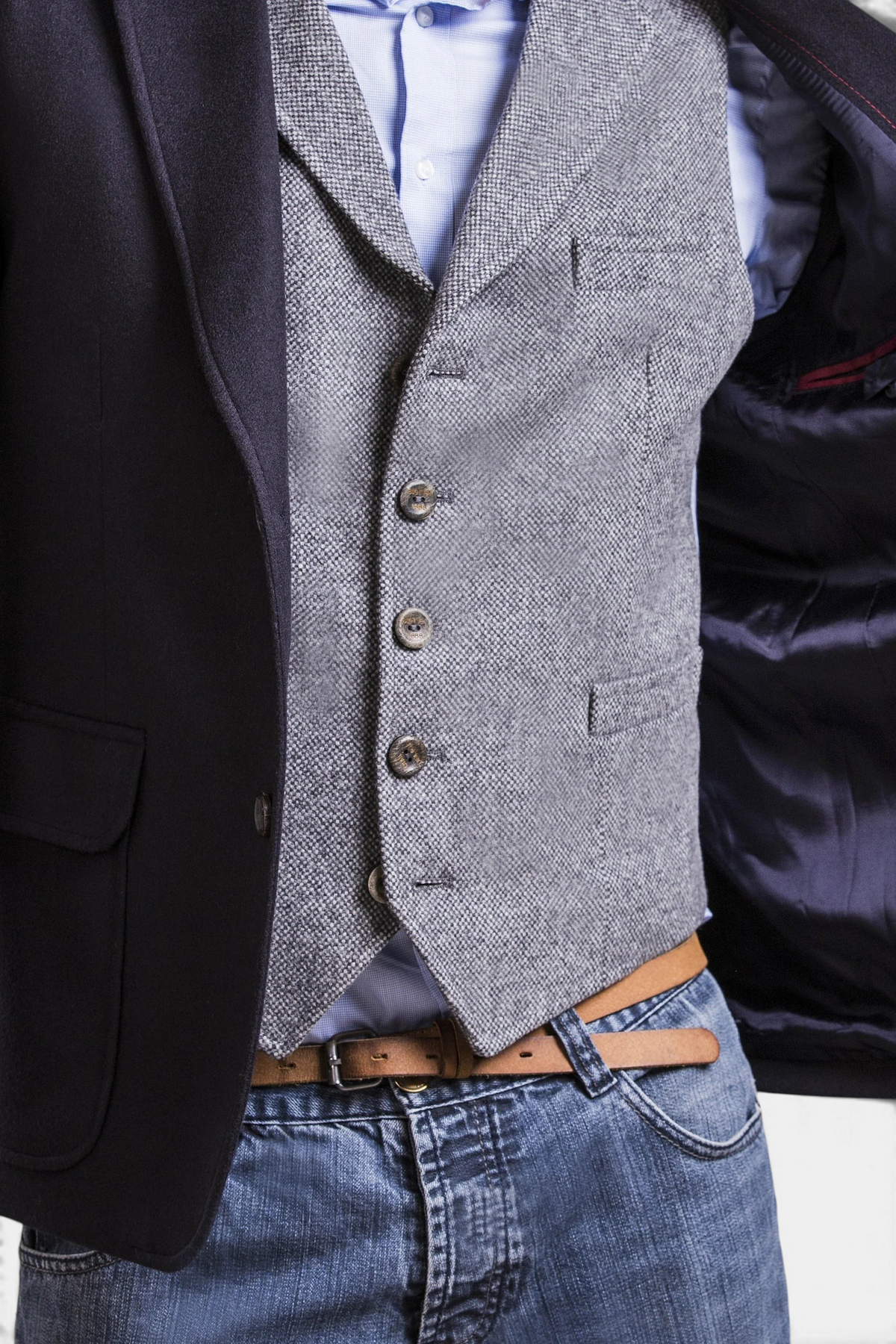 The Copper Shed Wilfred navy blue wool and alpaca blazer worn over a grey tweed waistcoat and light blue shirt