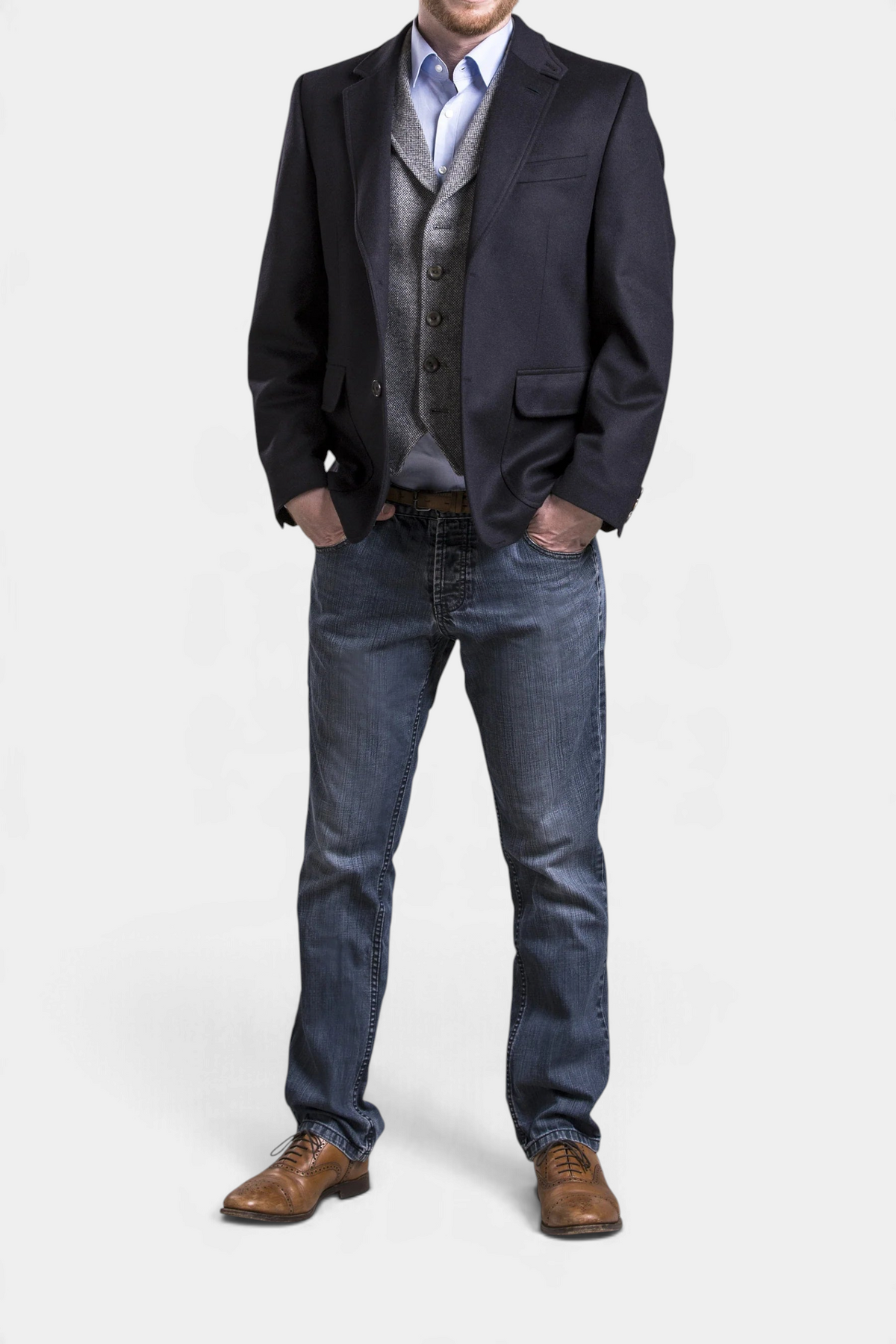 The Copper Shed Wilfred navy blue wool and alpaca blend blazer worn over a grey waistcoat and blue shirt