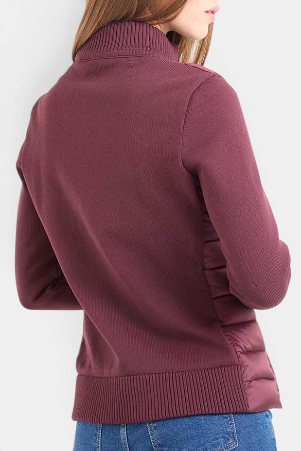 The Copper Shed Zilia long sleeve vest in wine featuring a textured knit back and collar with a sleek zip-up design.