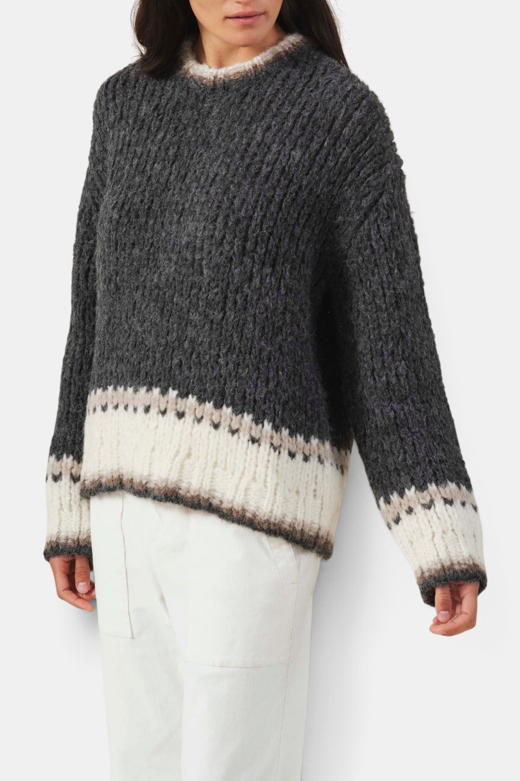 The Copper Shed Zoe alpaca blend crew neck sweater in charcoal and cream with a textured Fair Isle knit pattern.