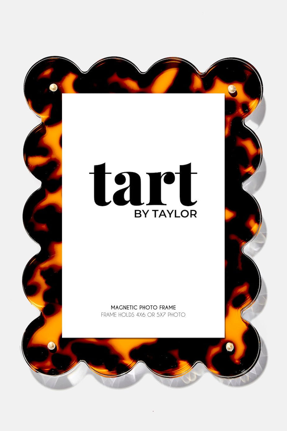 Tortoiseshell patterned magnetic photo frame with 'tart by Taylor' branding on a white background